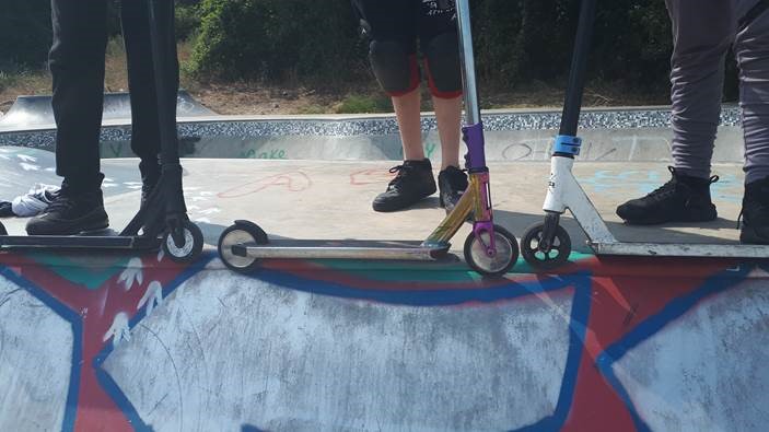 Scooters At Skatepark